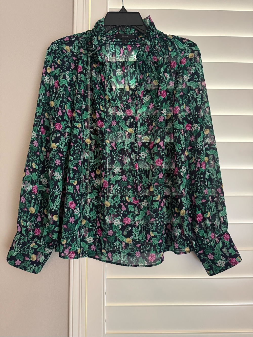 J. Crew Black Floral Ruffle V-Neck Blouse
(free cami top included)